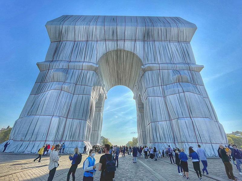 Arc de Triomhe in Paris wrapped in shimmering silver fabric 
